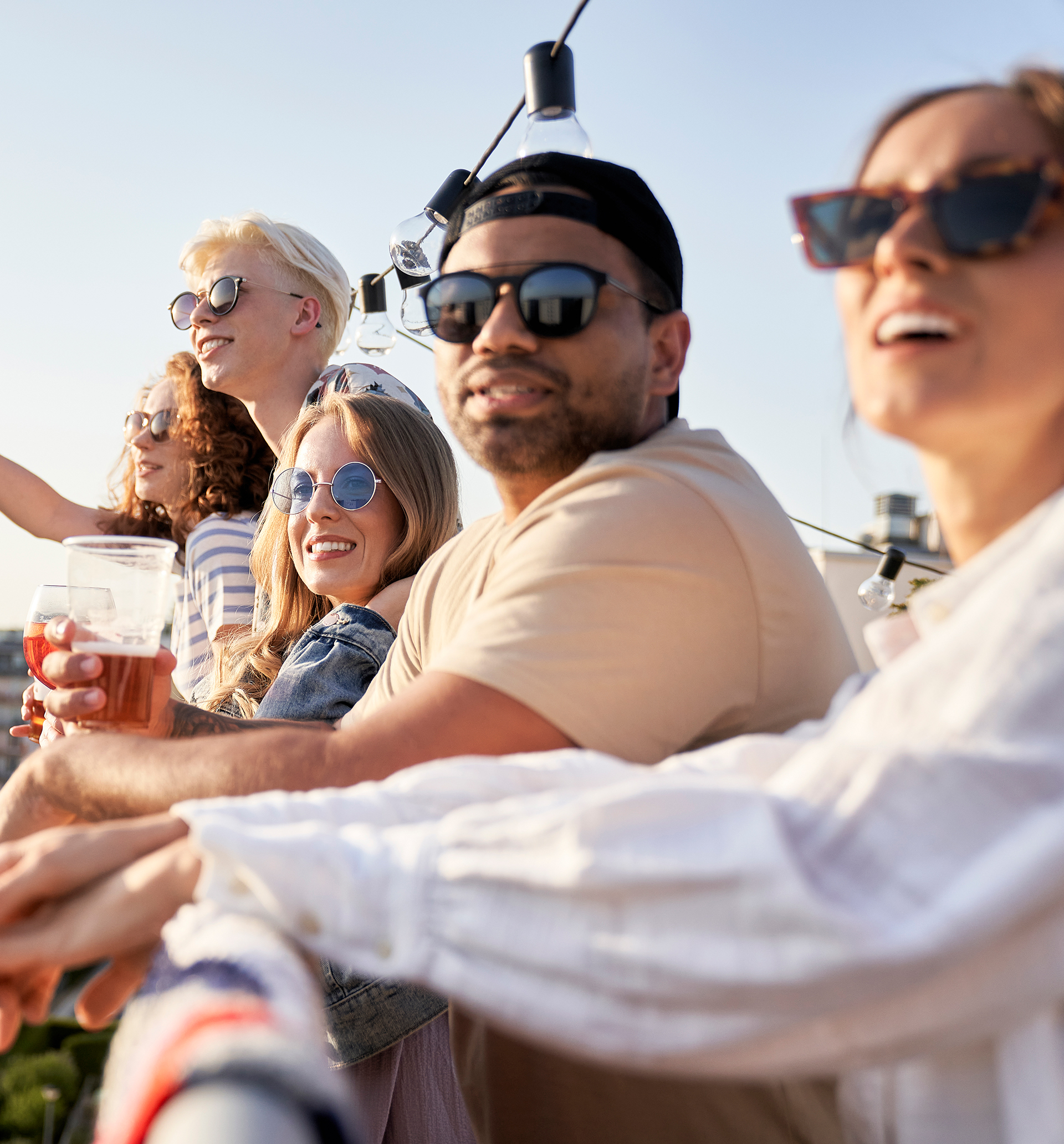 multi-ethnicity-friends-at-the-rooftop-party-in-su-2023-11-27-05-09-41-utc-EDIT